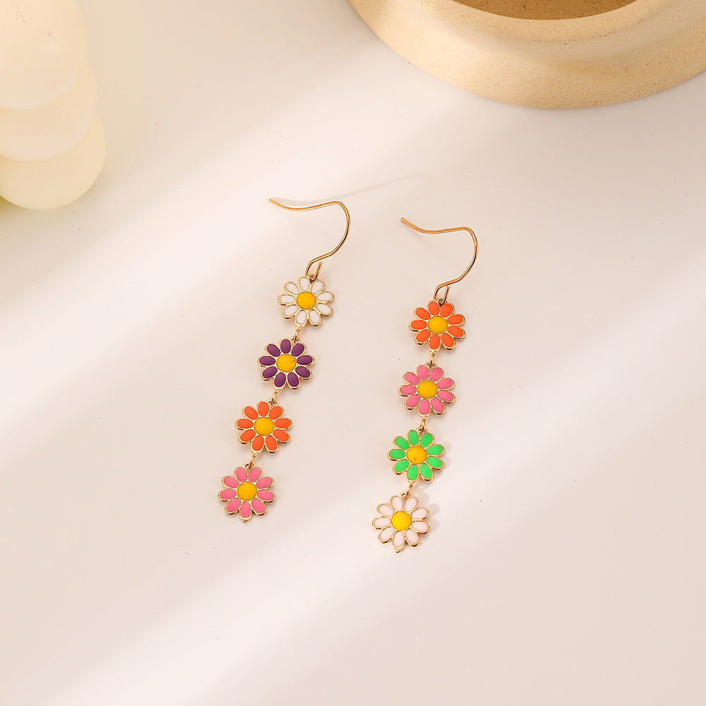 Pendientes de aleación de color de flores pequeñas al por mayor Daisy